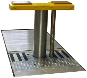 Dispositivo de elevación de carga empotrado, a ras de suelo con placas de nivelación neumátca